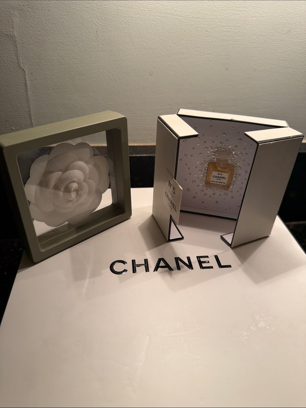 CHANEL Branded Decorative Display with White and Cream Accents Camila Flower inc
